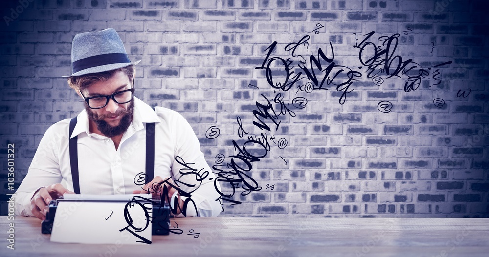 Composite image of hipster wearing eye glasses and hat working