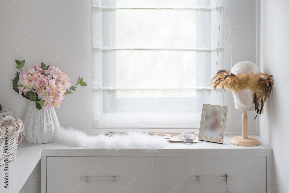 dressing table with vase of flower