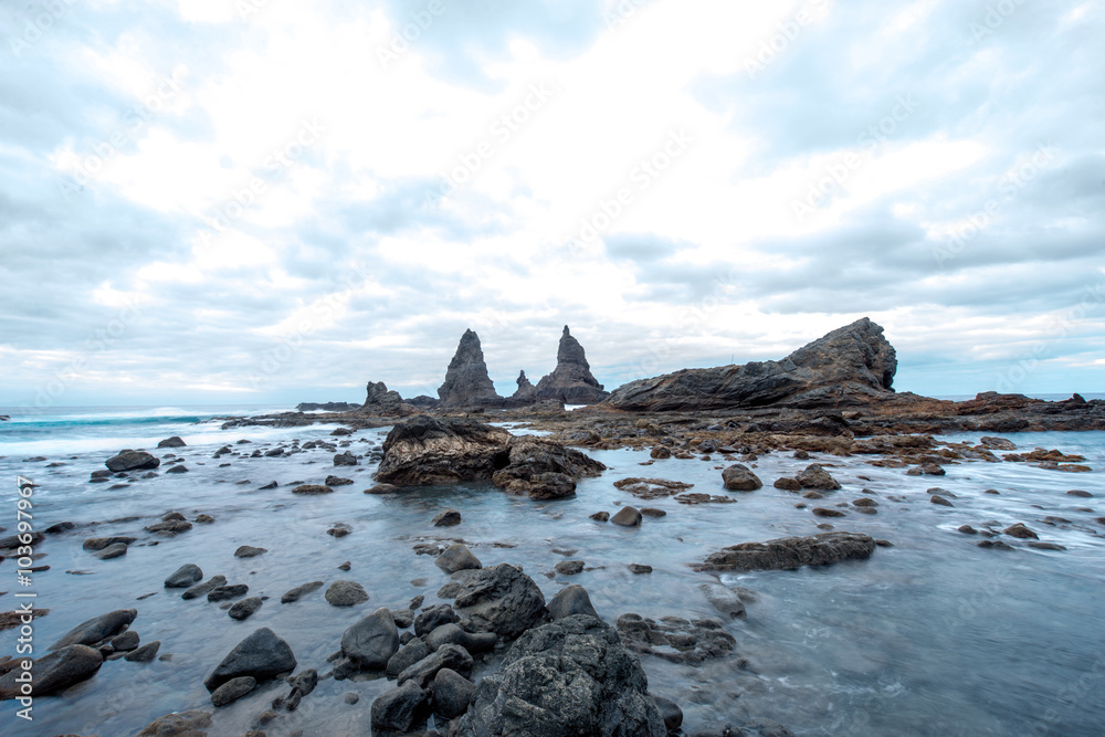 Stone coast with sharp cliffs on the western part of La Gomera island in Spain