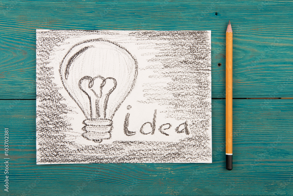 Idea concept - bulb drawn with pencil