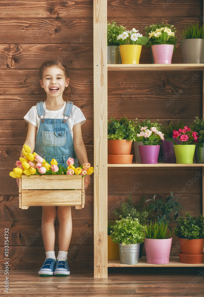 girl caring for her plants