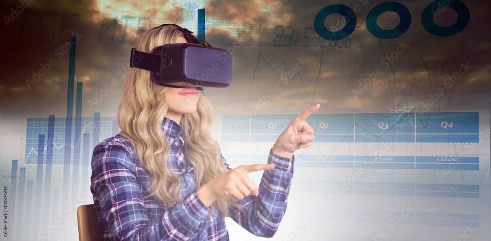 Composite image of pretty casual worker using oculus rift