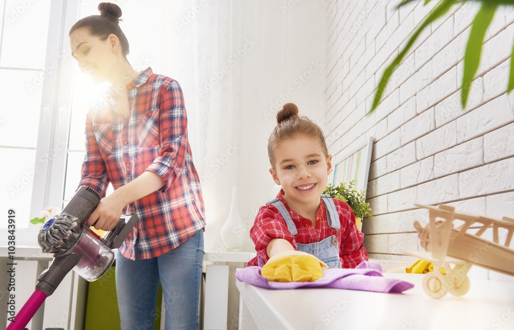 family cleans the room