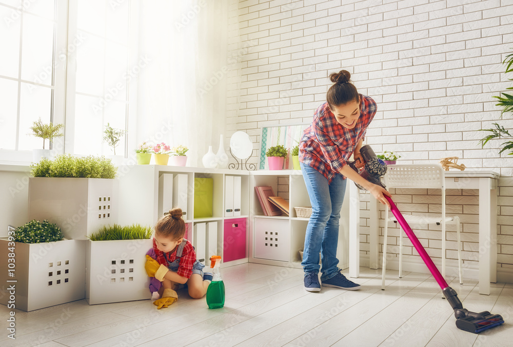 family cleans the room