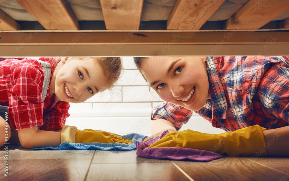 family cleans the room