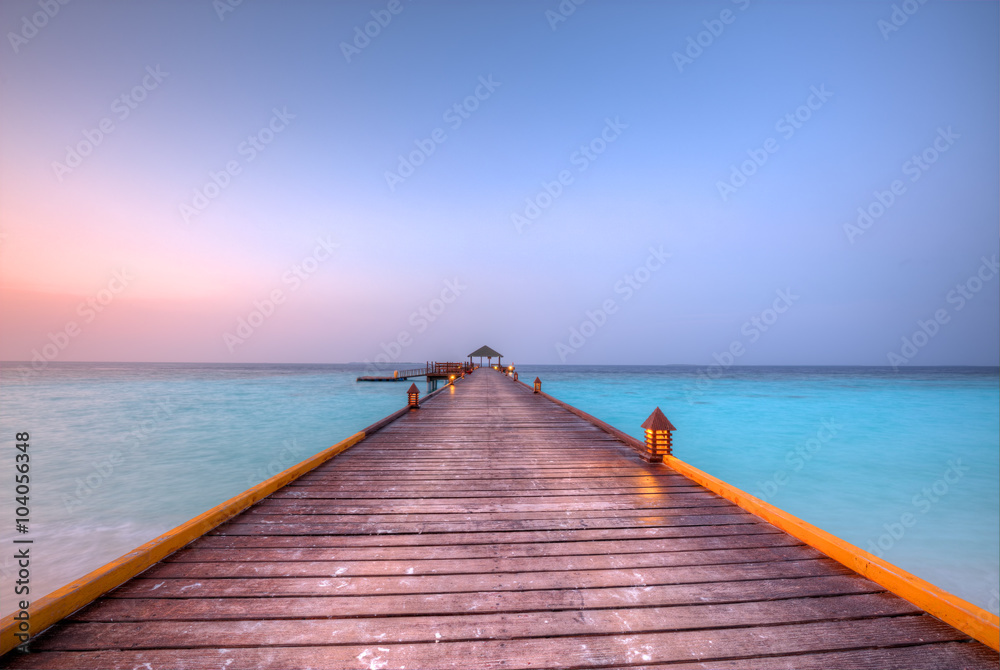 Wooden jetty in sunset