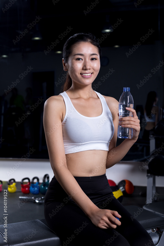 beautiful girl working out in moder gym