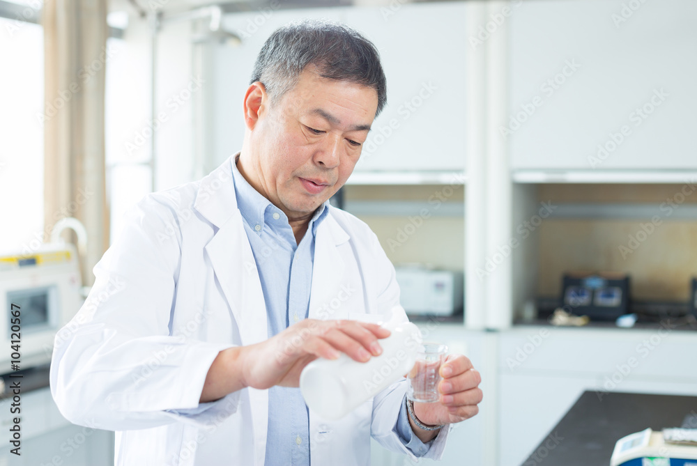 man doing chemical experiment