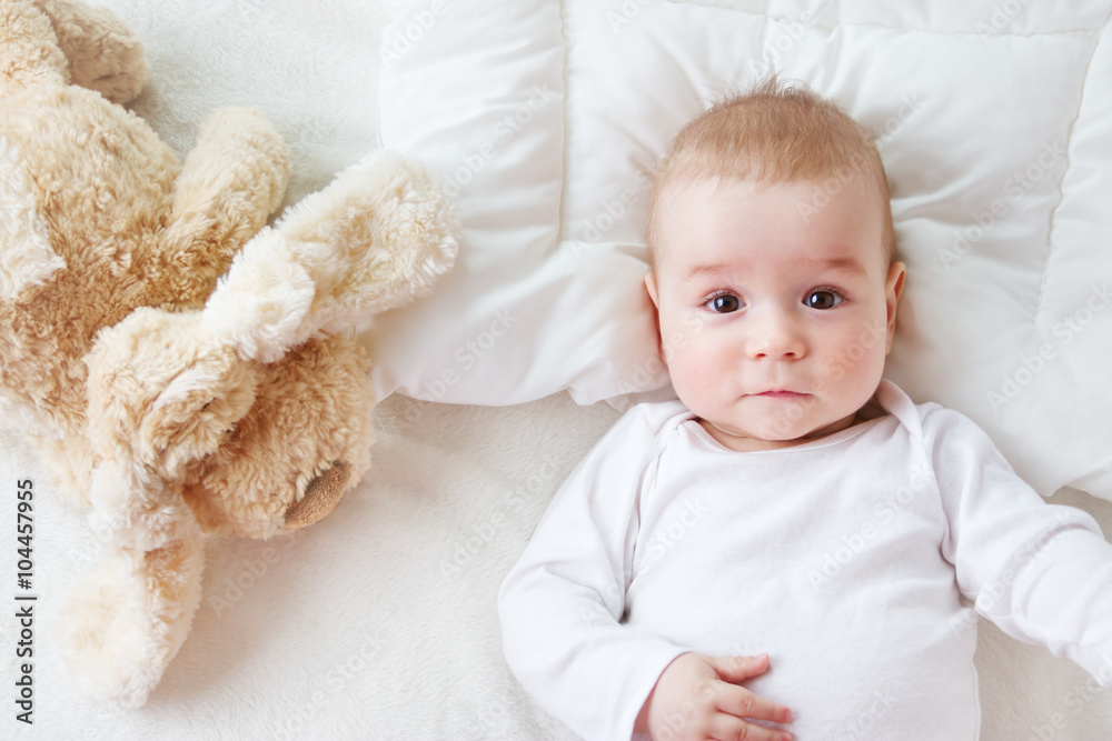 seven month old baby in the bed