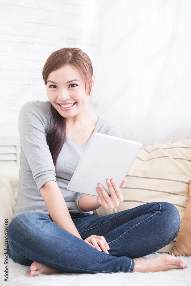 smile woman hold digital tablet