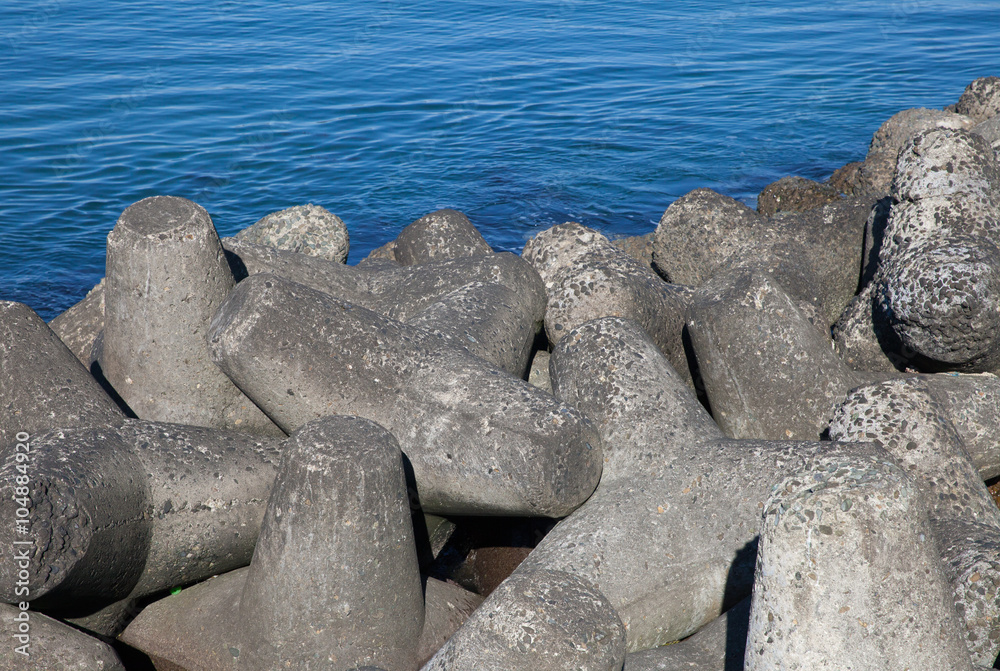 Breakwater concrete dam , structure constructed on coasts as part of coastal defense