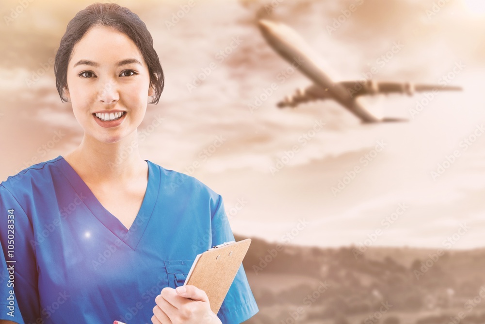 Composite image of asian nurse with stethoscope 