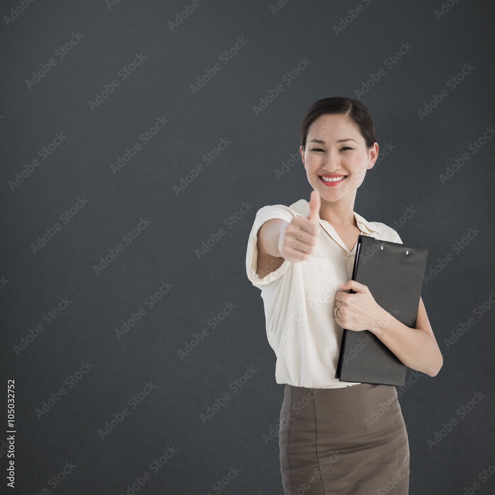 Composite image of woman gesturing thumbs up 