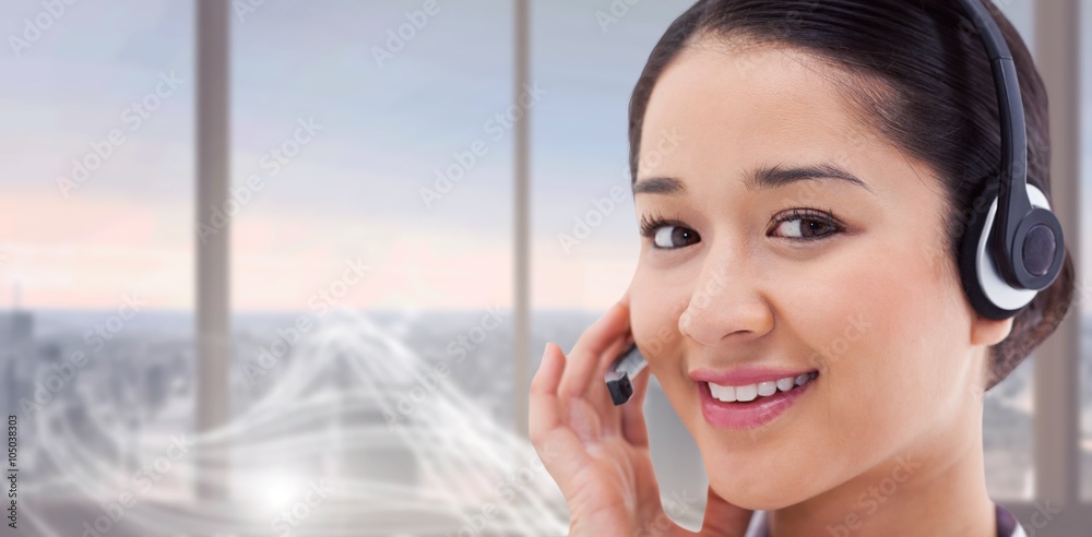 Composite image of close up of a smiling operator posing