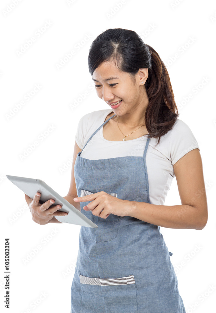 Waitress taking an order using tablet PC