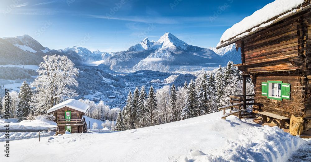 Winter wonderland in the Alps with traditional mountain chalets