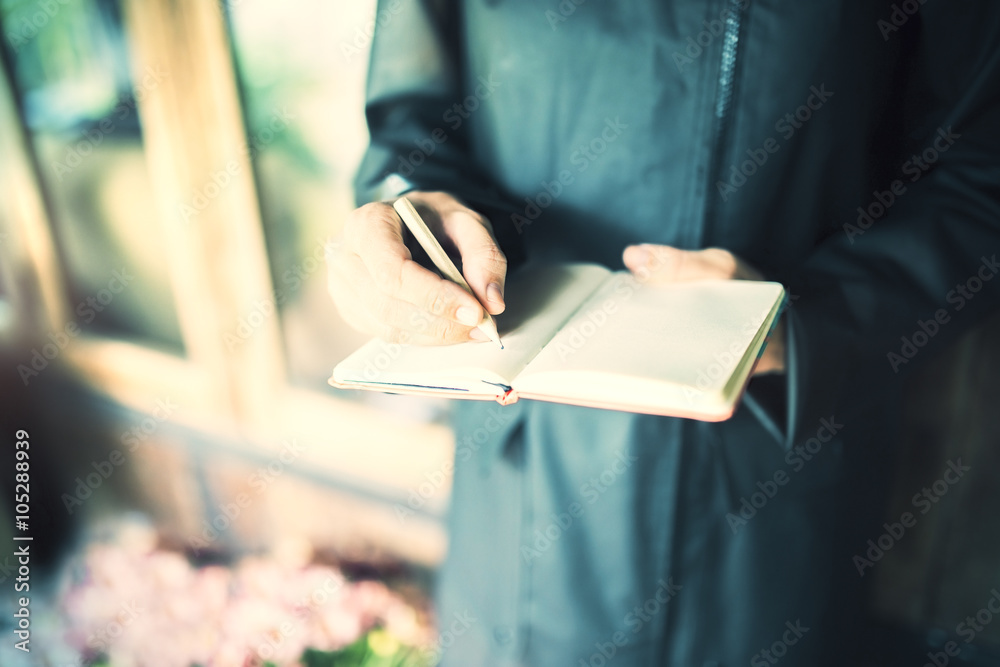 Hand writing in notebook side