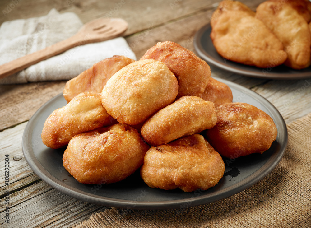 plate of fried meat pies belashi