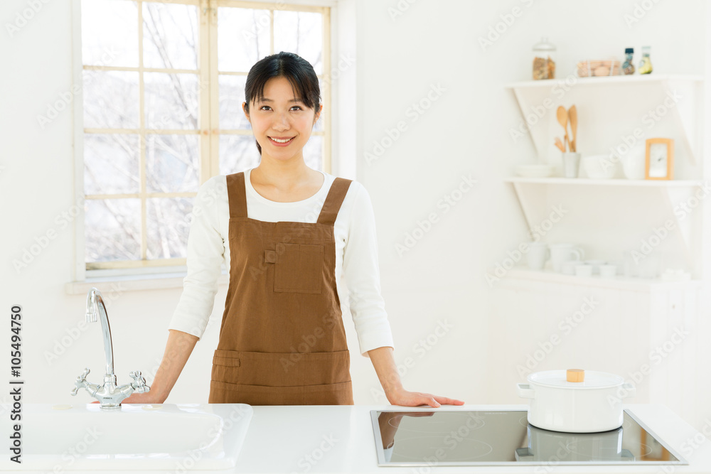 young asian woman in the kitchen