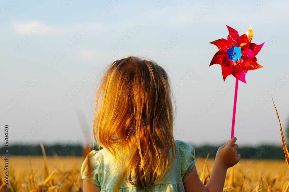 Girl on a wheat