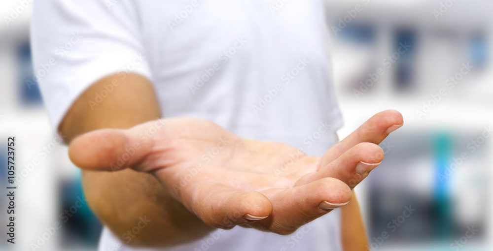 Young man on office background