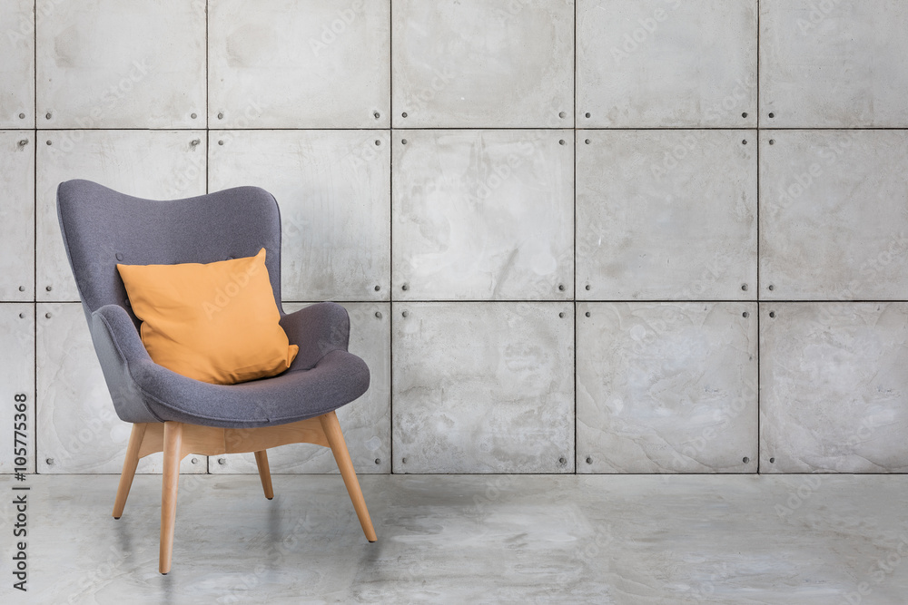 modern wooden chair and concrete wall