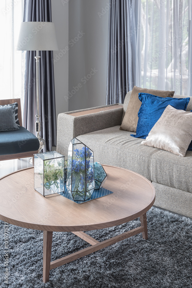 modern living room with wooden round table