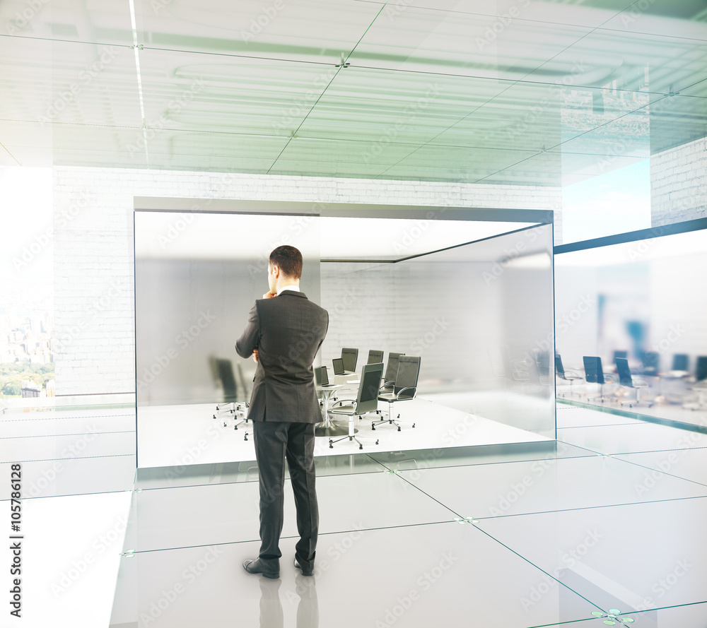 Conference room interior with businessman