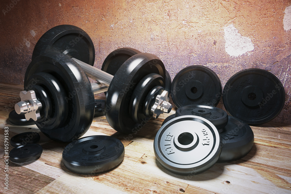 Dumbbells on wooden floor