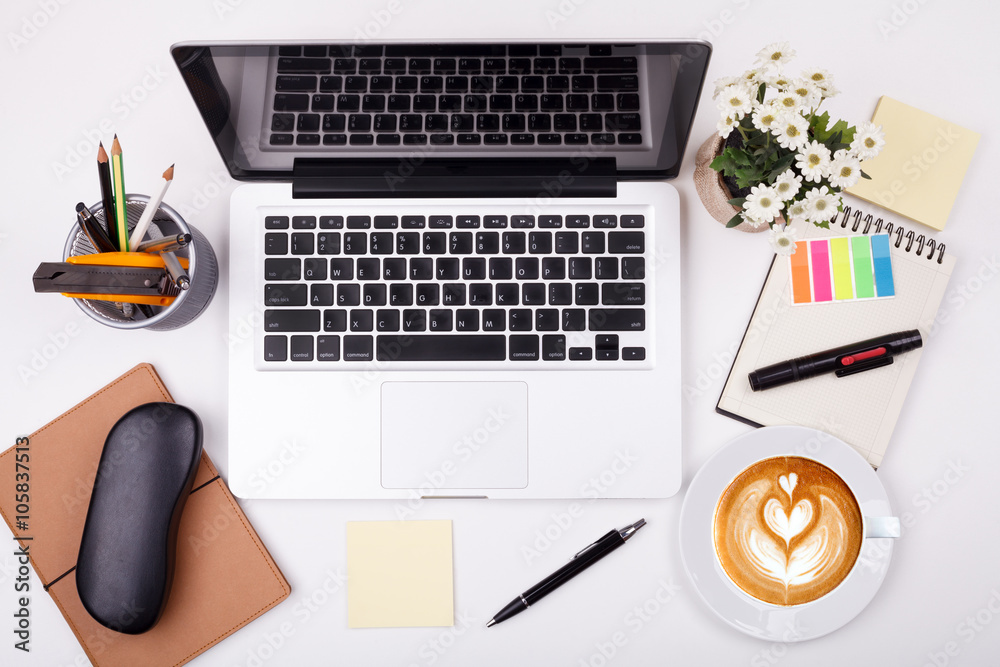 Top view laptop or notebook workspace office on white table