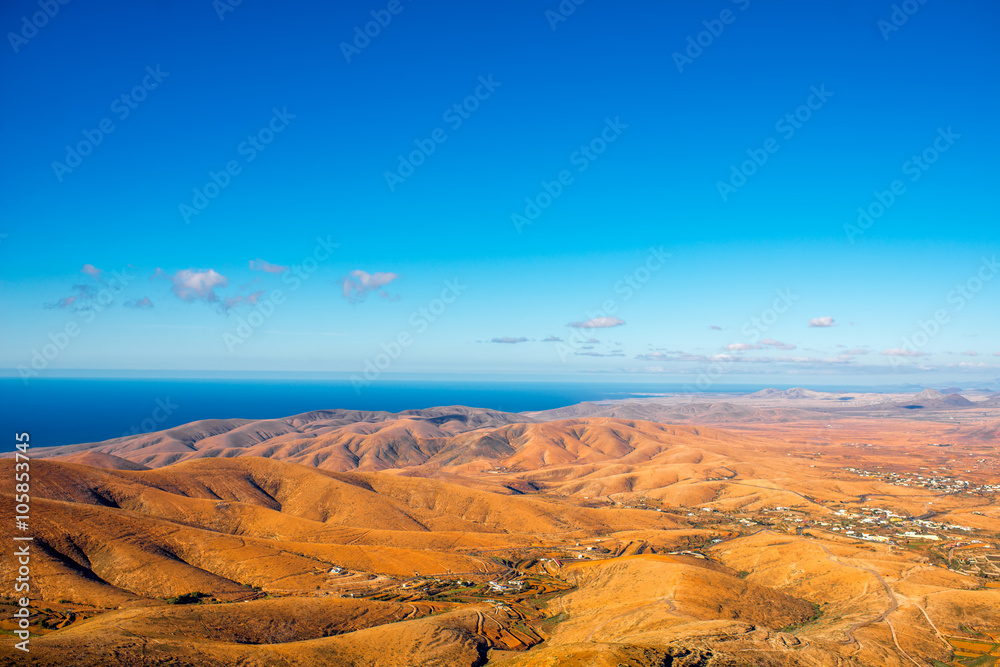 Aerial view on Fuerteventura island from Morro Velosa viewpoint with beautiful soft mointains landsc