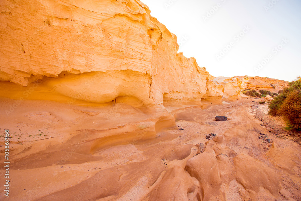 Natural dried riverbed with beautiful solid sand shapes on Fuerteventura island in Spain 