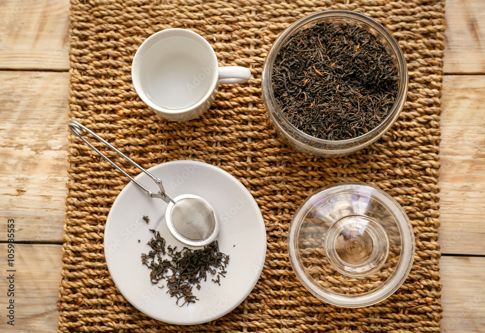 Tea set on the wooden background  top view