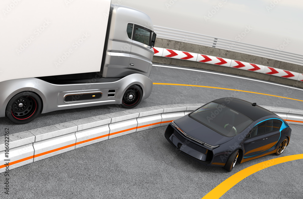 Hybrid electric truck and white electric car on highway