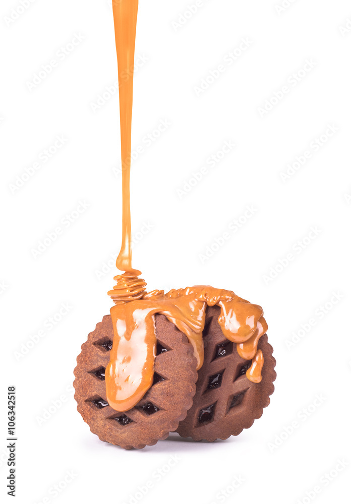 sweet caramel sauce is poured on a cookies