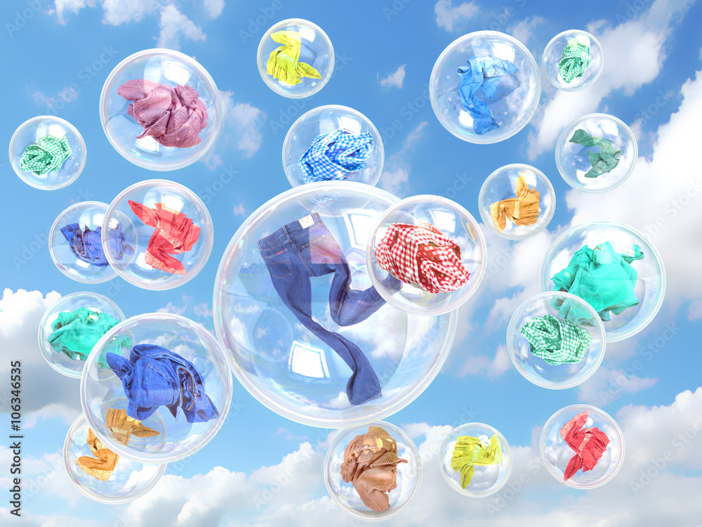 clothing in soap bubbles on sky background concept of washing