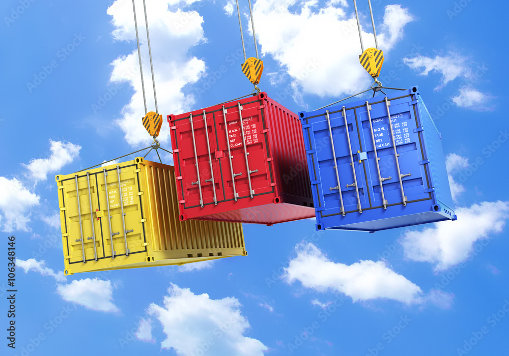 Four shipping containers during transport on a sky background