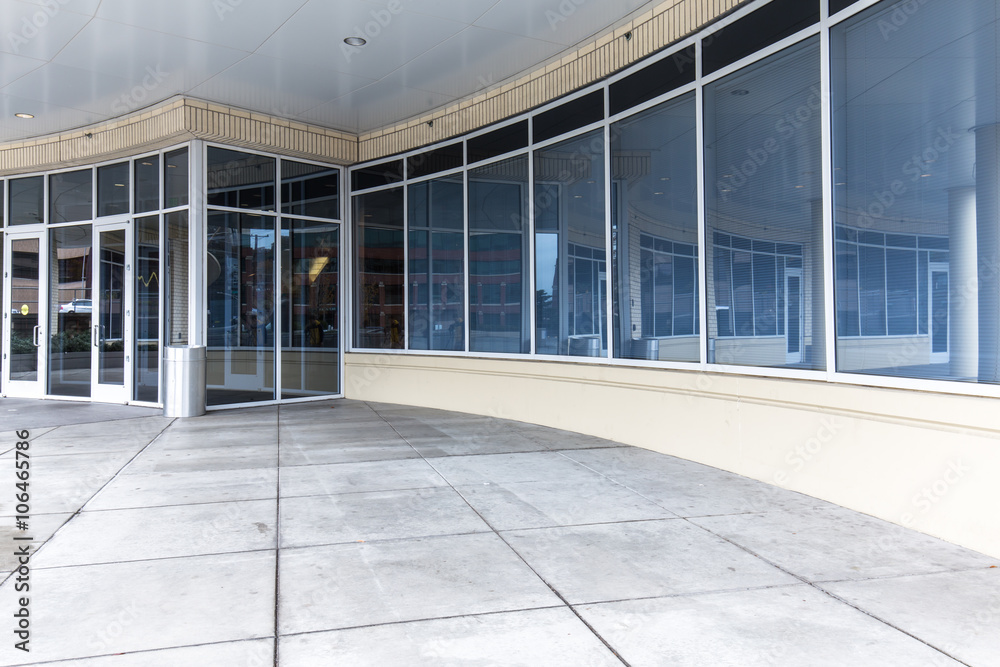 empty pavement front of modern buildings in portland