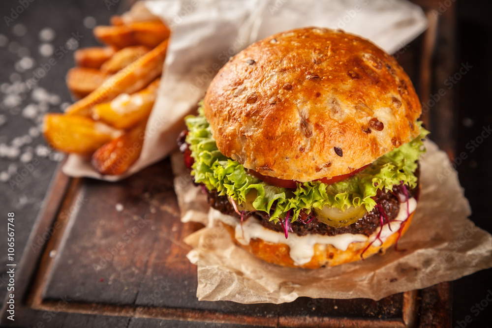 Fresh home-made hamburger served on wood