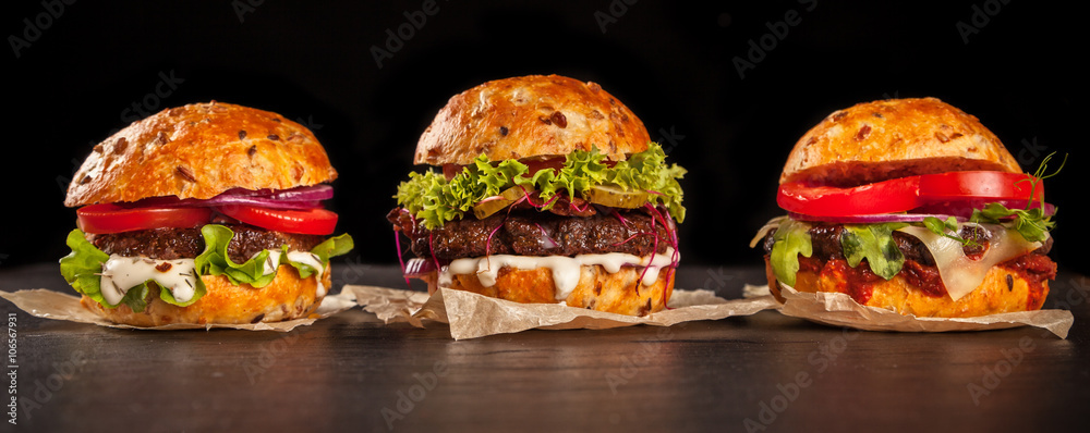 Fresh home-made hamburgers served on stone