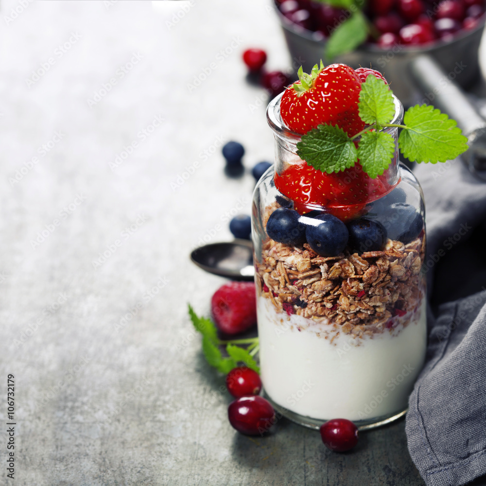 Yogurt with baked granola and berries