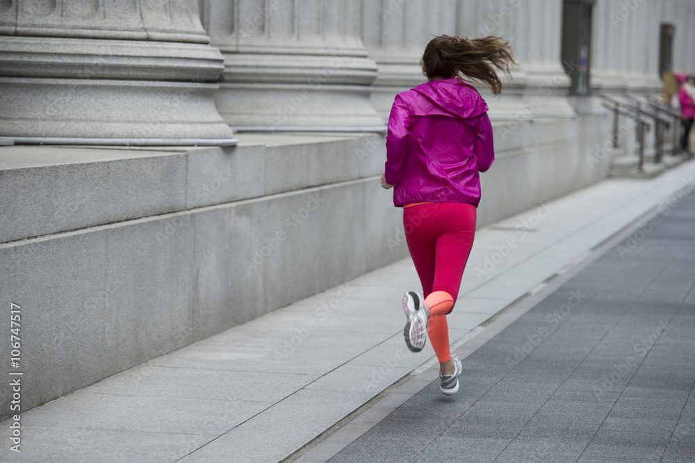 From behind the long hair of the woman is running