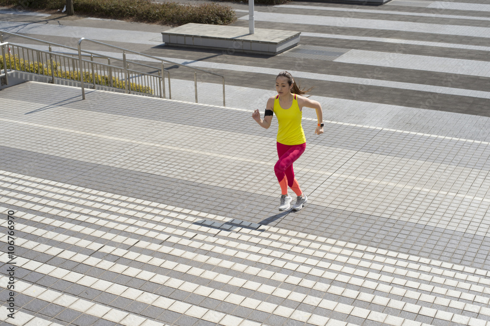 Women who are training on the stairs