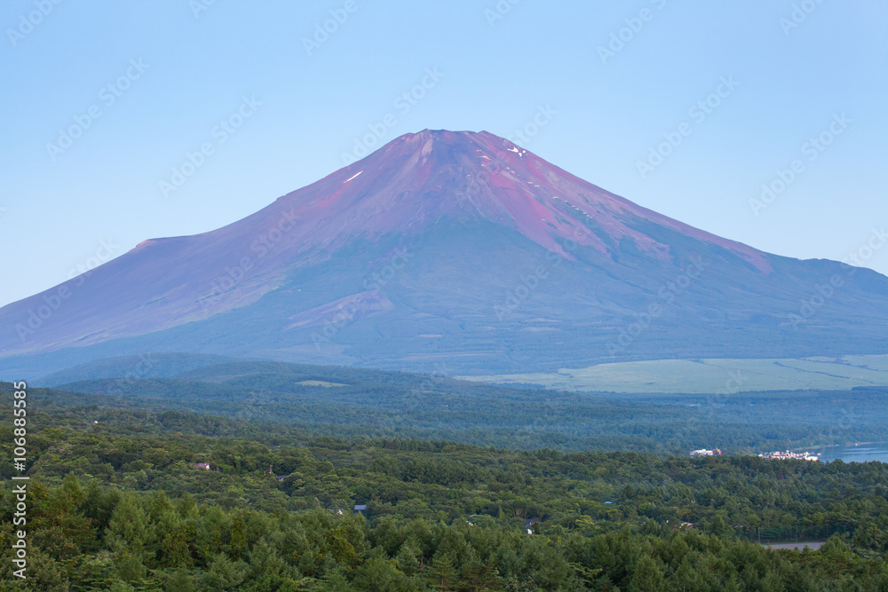 Red color at Top of Mountain Fuji in summer early morning seen from Lake Yamanaka , Yamanashi prefec