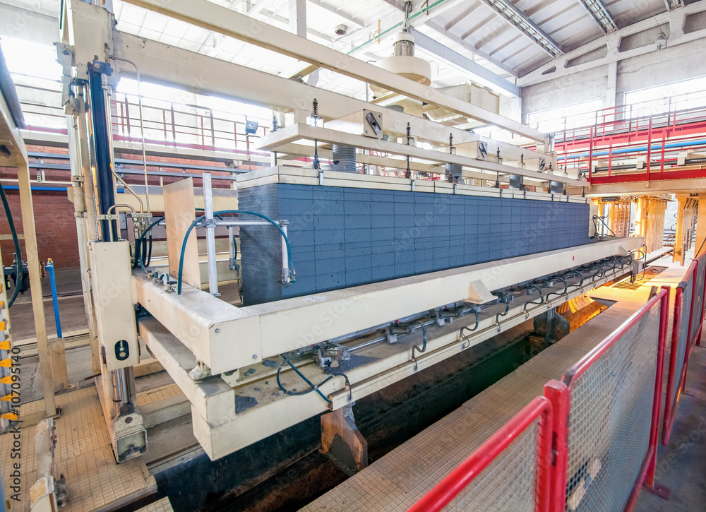 Production of aerated concrete blocks at factory processing step