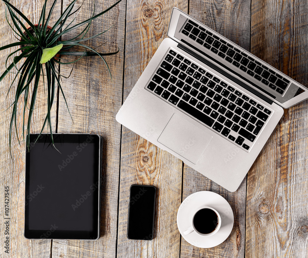 Comfortable working place at wooden table