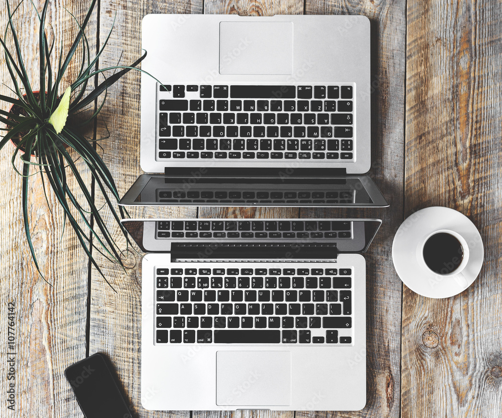 working place at home for two on wooden table