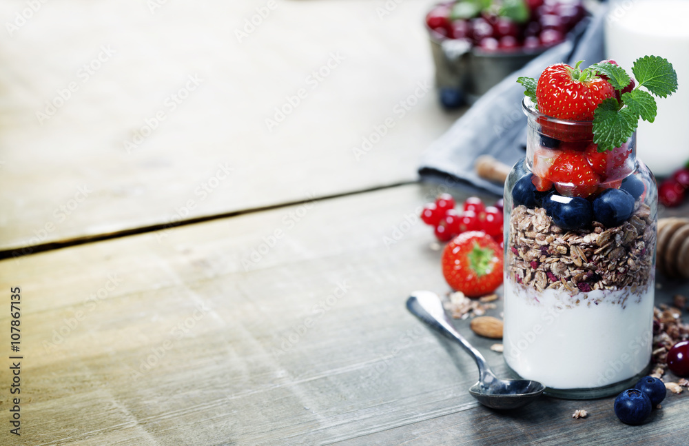 Yogurt with baked granola and berries