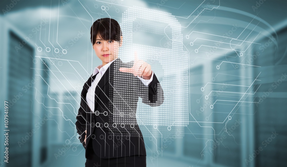 Composite image of focused businesswoman pointing