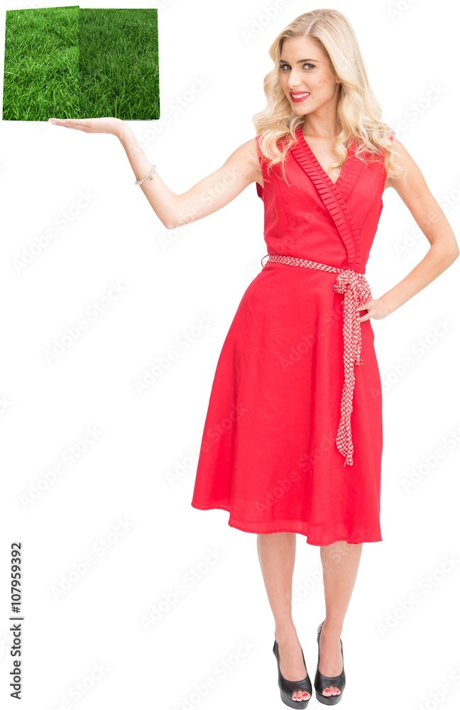 Woman holding lawn book